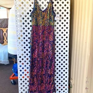 Very luxurious long gold and blue sequined dress. Size 12. R &M brand.